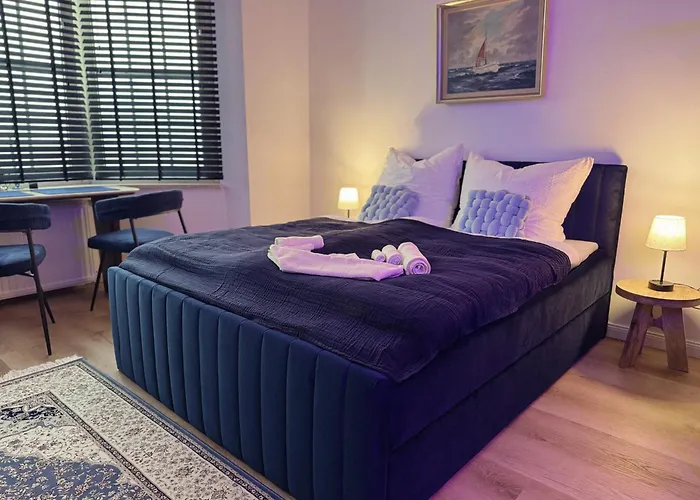 CuxHeaven - modernes Studio-Apartment direkt am Meer mit 65 Zoll TV und Tiefgarage in Duhnen Cuxhaven